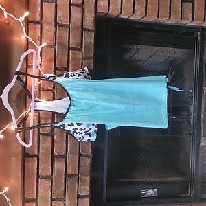 Size 4X bathing suit top. Mint green white and black.